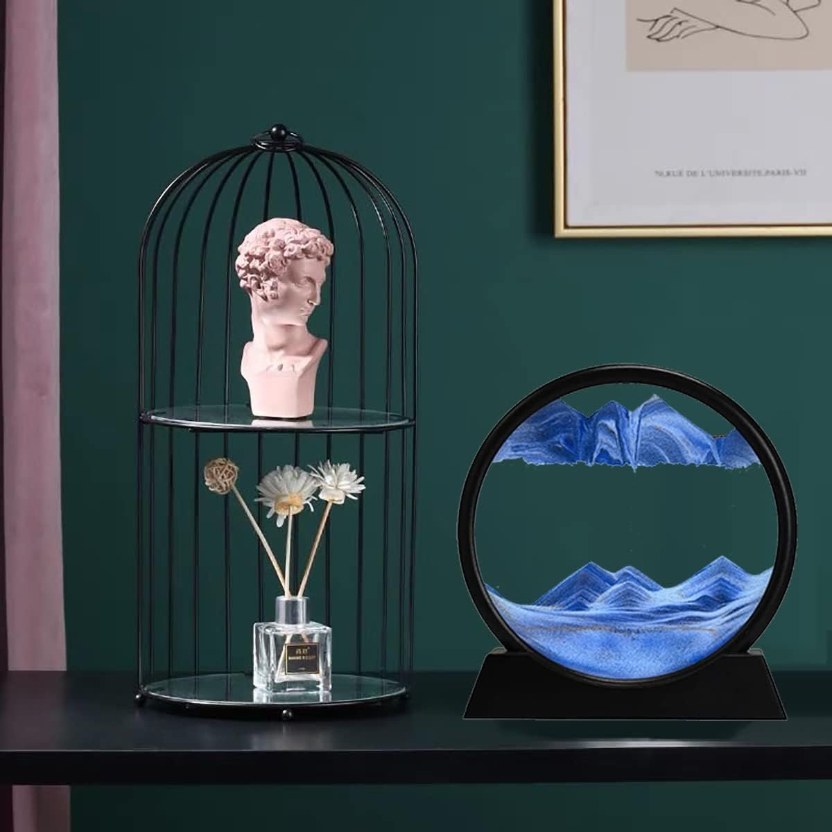 Flowing sand landscape display with circular black frame