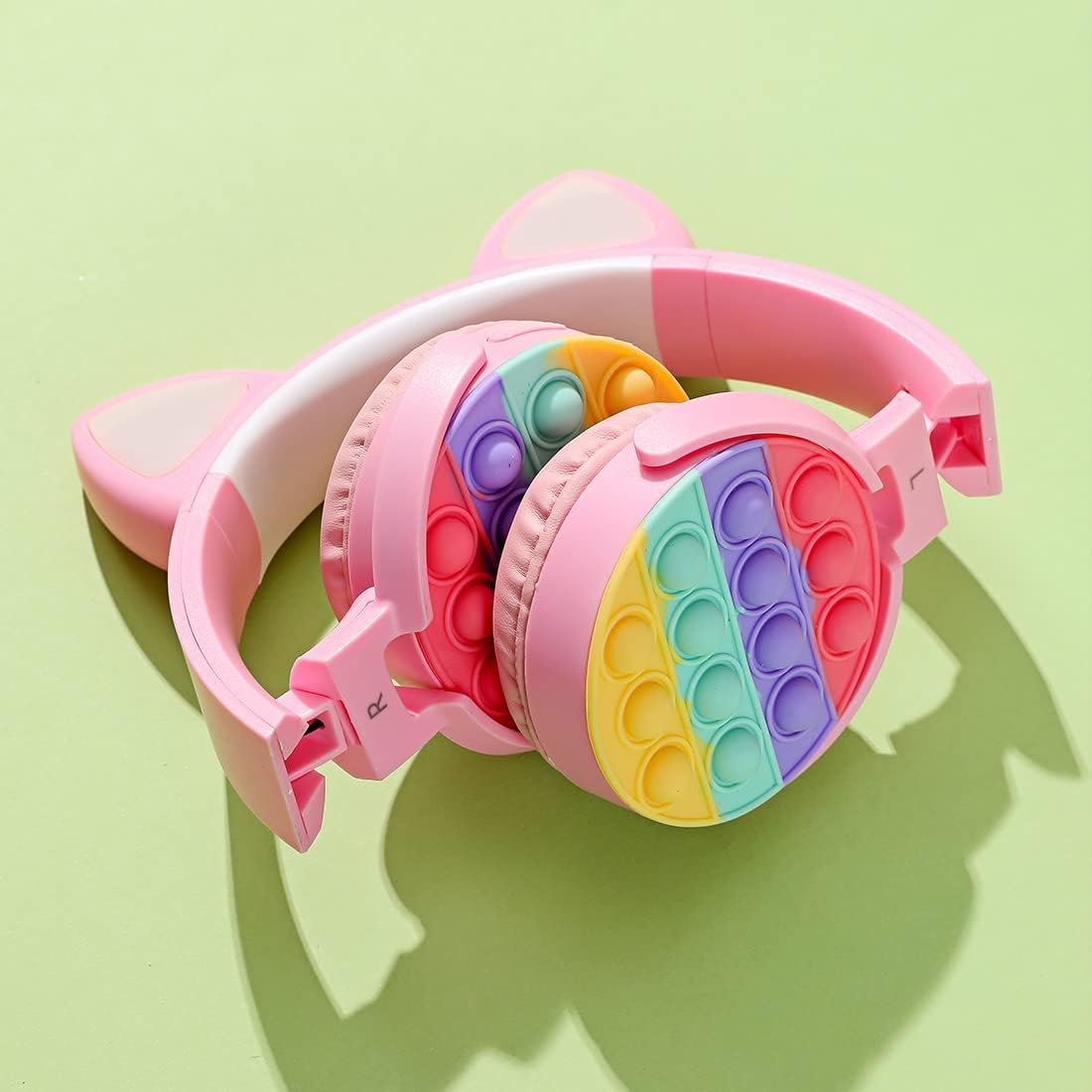 Pink wireless cat ear headphones for kids with pop fidget buttons